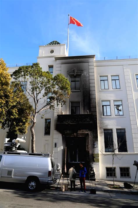 San francisco chinese consulate - Law enforcement members stand on the street near the Chinese consulate, where local media has reported a vehicle may have crashed into the building, in San Francisco, California, U.S. October 9, 2023